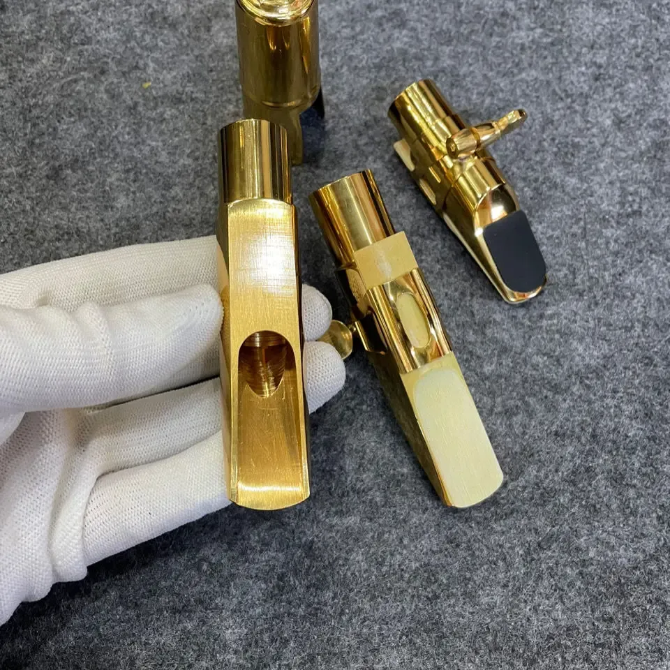 サクソフォン真鍮のゴールドプレートサックスマウスピーステナー/ソプラノ/アルトサックス弾丸の弾丸絵のマウスピース楽器の楽器アクセサリー