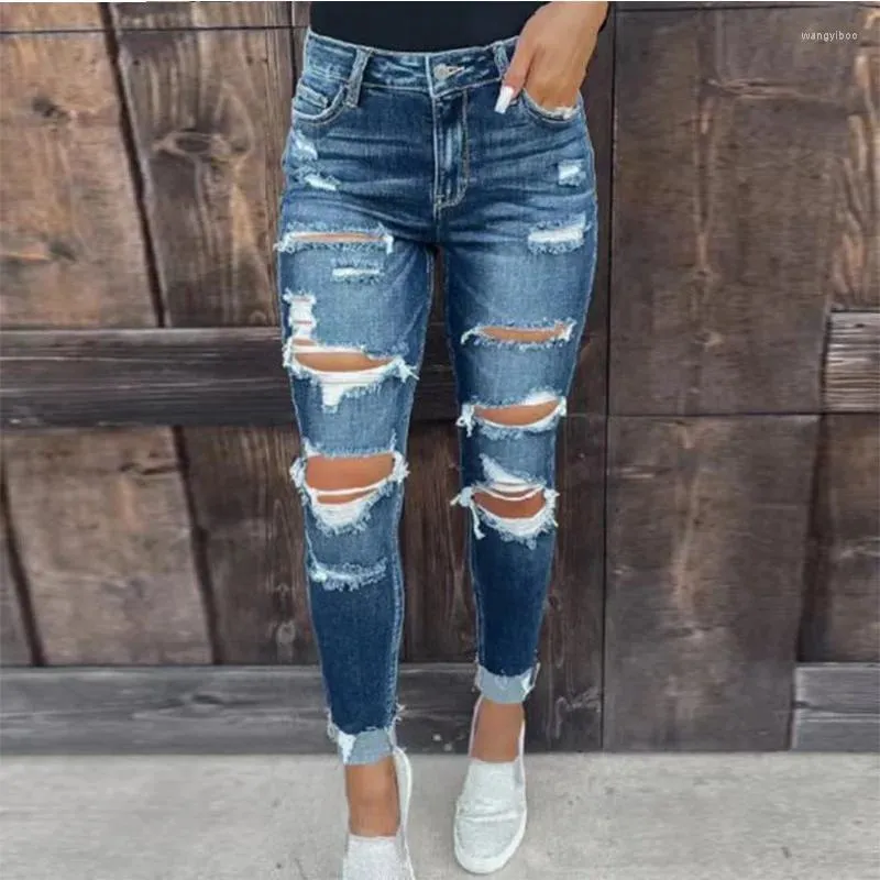 Dames jeans elastische gat denim broek gewassen met kleine voeten en strakke heupen zijn nog steeds vrouwen.Gescheurd