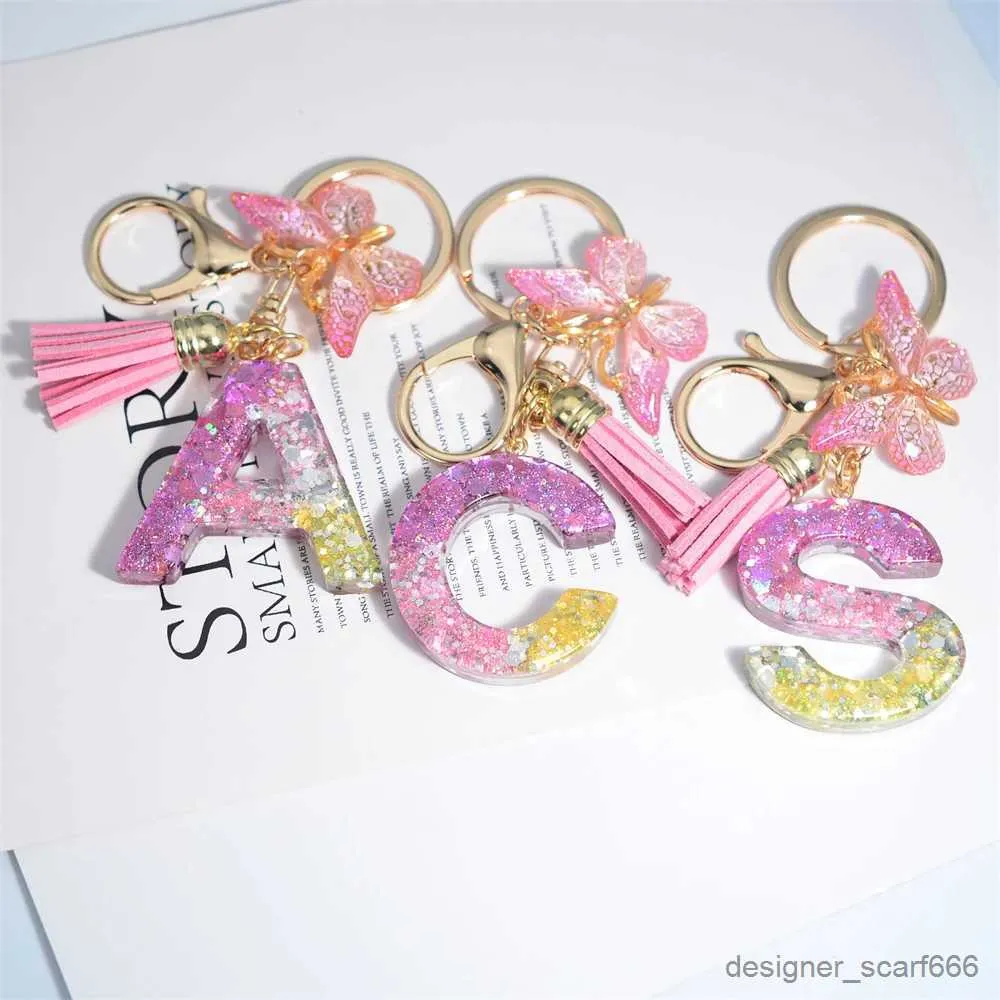 Keychains Lanyards Söt harts A-Z Initialer Letter Keychain Pink Sparkle Farterfly Tassel Pendant Keyring For Women Girl Purse Handväskor smycken gåva