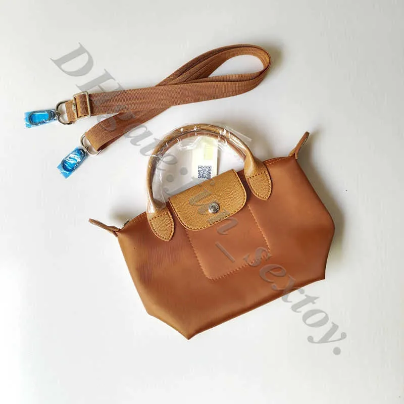Lyxigt högkvalitativt varumärke tjockt tyg Kvinnor Desinger mode handväska messenger väska läder axel tygväskor arbete resor mn4g