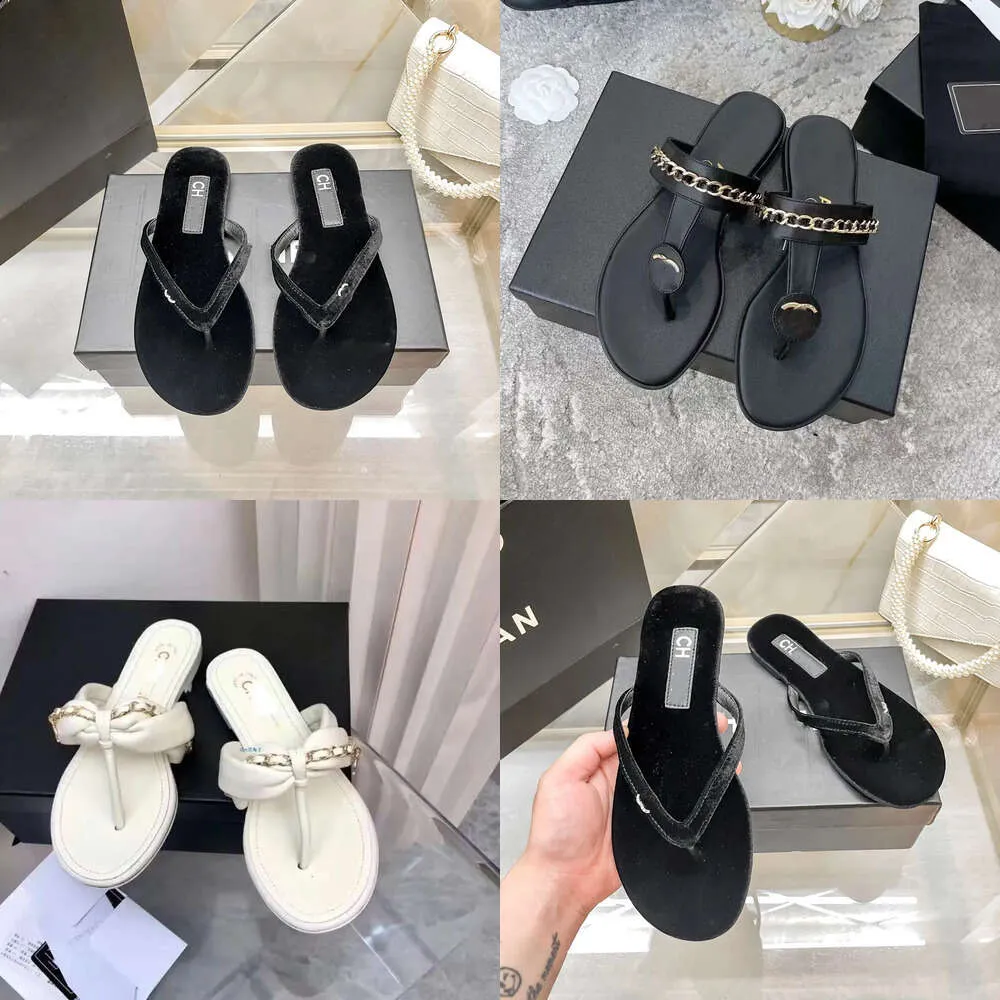Flat designer tofflor 2024 Summer Veet Crystal Metallic Brand Shoes for Women Sandals Non-Slip Sexy Beach Flip-Flops Chslides Tories Thong 35-41 Original kvalitet