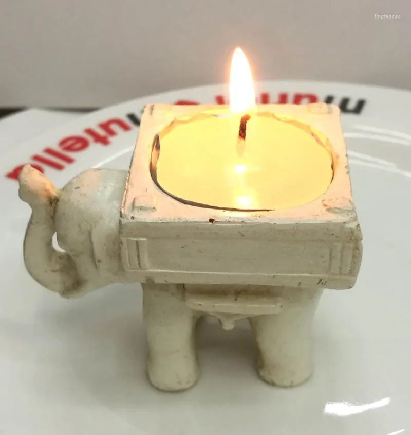 Titulares de velas 50pcs/lote presente de casamento e decorações resina elefante castiçal Lucky Tea Light Solter