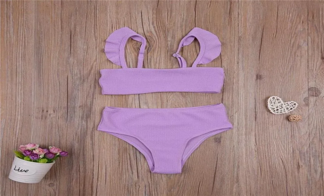 Girls Solid Color Split zwempakset Mouwloze Backless Low Cut Bikini met ruches slipje voor zomerse kledingsets5895575