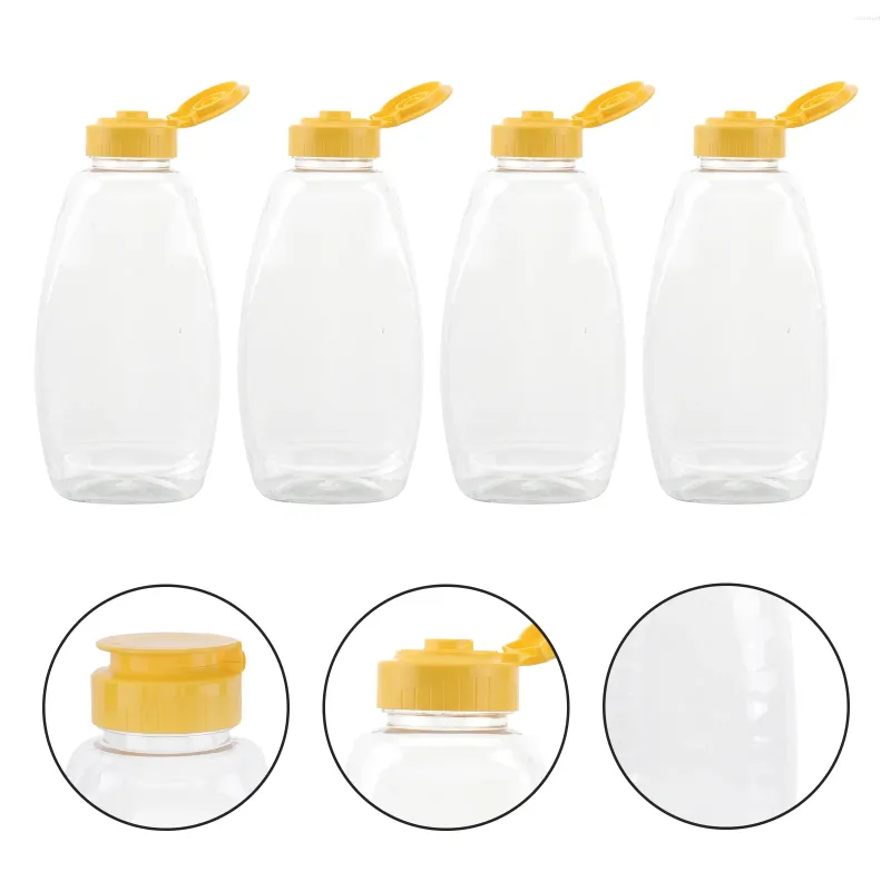 Bouteilles de rangement 4pcs en plastique transparent en plastique miel bouteille de bouteille d'emballage alimentaire avec récipient de confiture de couvercle pour la maison (500 g