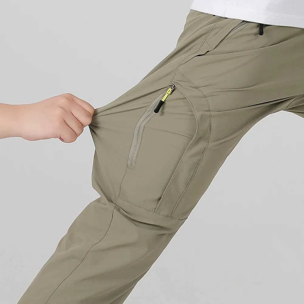 Pantaloni da uomo pantaloni di asciugatura rapida elastica a quattro lati adatti per pantaloni da esterno da uomo in montagna leggeri e adatti agli elastici estivi elastici estivi pantaloni traspiranti 2404