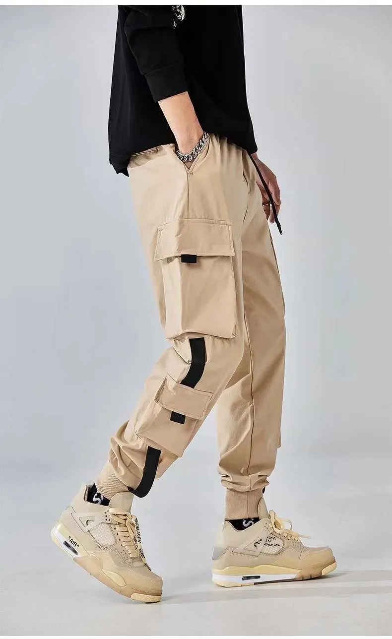 Herenbroek Classic Design Multi Flap Pocket Cargo Jogging Pants Mens Losse Fit geschikt voor het slepen van Harem Cargo Jogging PantsF2447