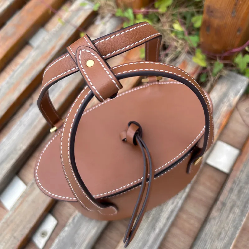 Högkvalitativ axelväska kvinnors handväska lyx importerad läder hink väska designer väska crossbody mode mini tote väska fabrik grossist stor kapacitet väska