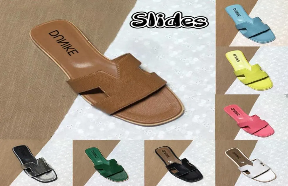 Avec bac à pantoufle Orans Designer Sandale Femmes Glines Sandales de plage Chaussures de luxe Gétille Filp en cuir Sandales Summer Flat Slip2652645