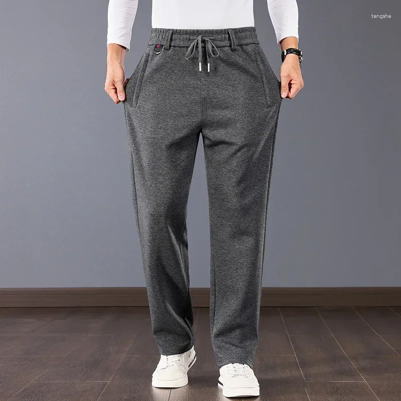 Pantalon pour hommes printemps automne couleur solide mode pantalon de survêtement de taille élastique man