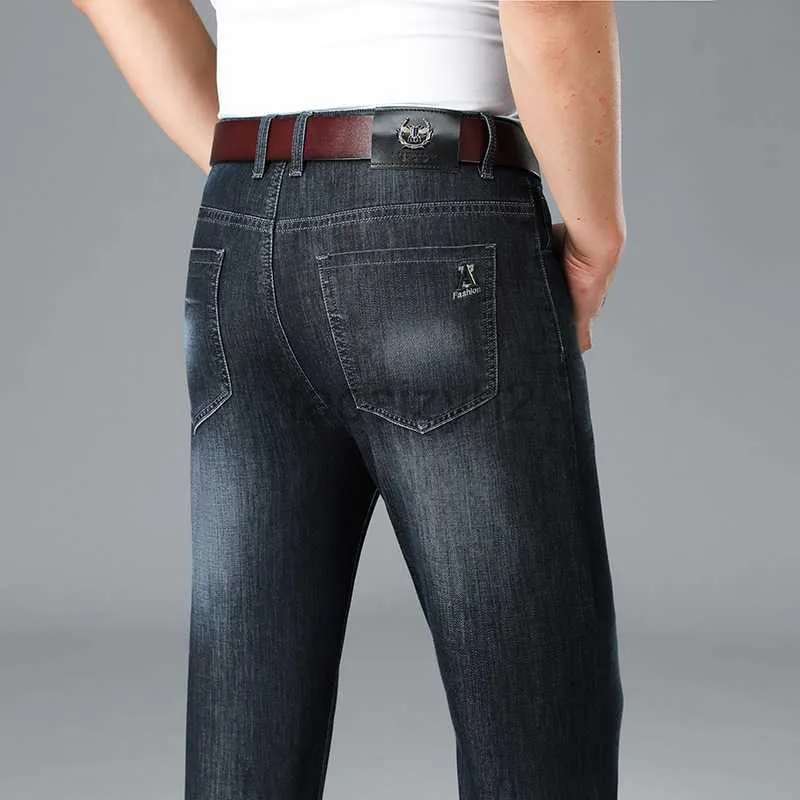 Heren jeans lente/zomer nieuwe heren jeans business van middelbare leeftijd casual elastische jeans slank fit rechte been heren broek plus size broek