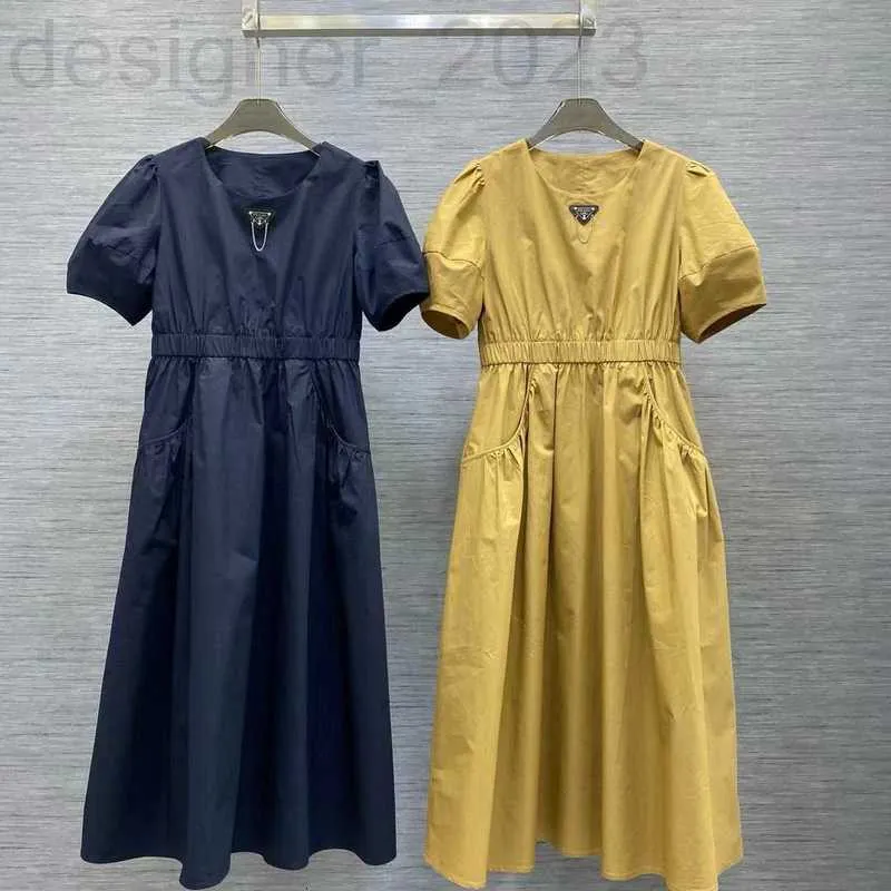 Designer de robes décontractées de base spécialement conçue pour les manches bulles de coton printemps / été du printemps / été avec la taille arrière exposée grande robe longue swing s5ox