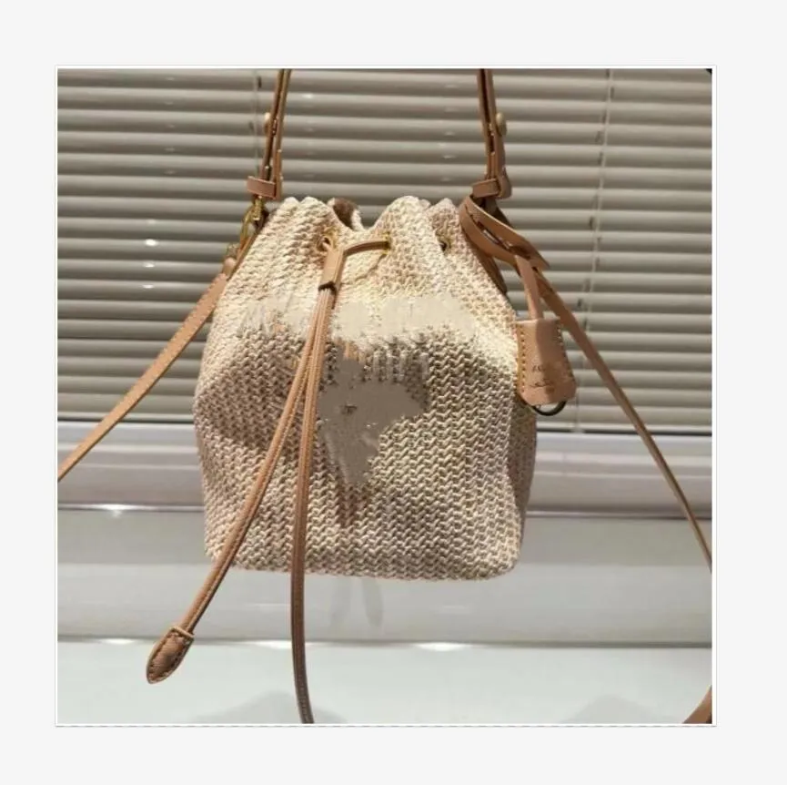 HOT designer bag bucket bag leisure straw woven material leisure sports bag can be carried across the body Free shipping