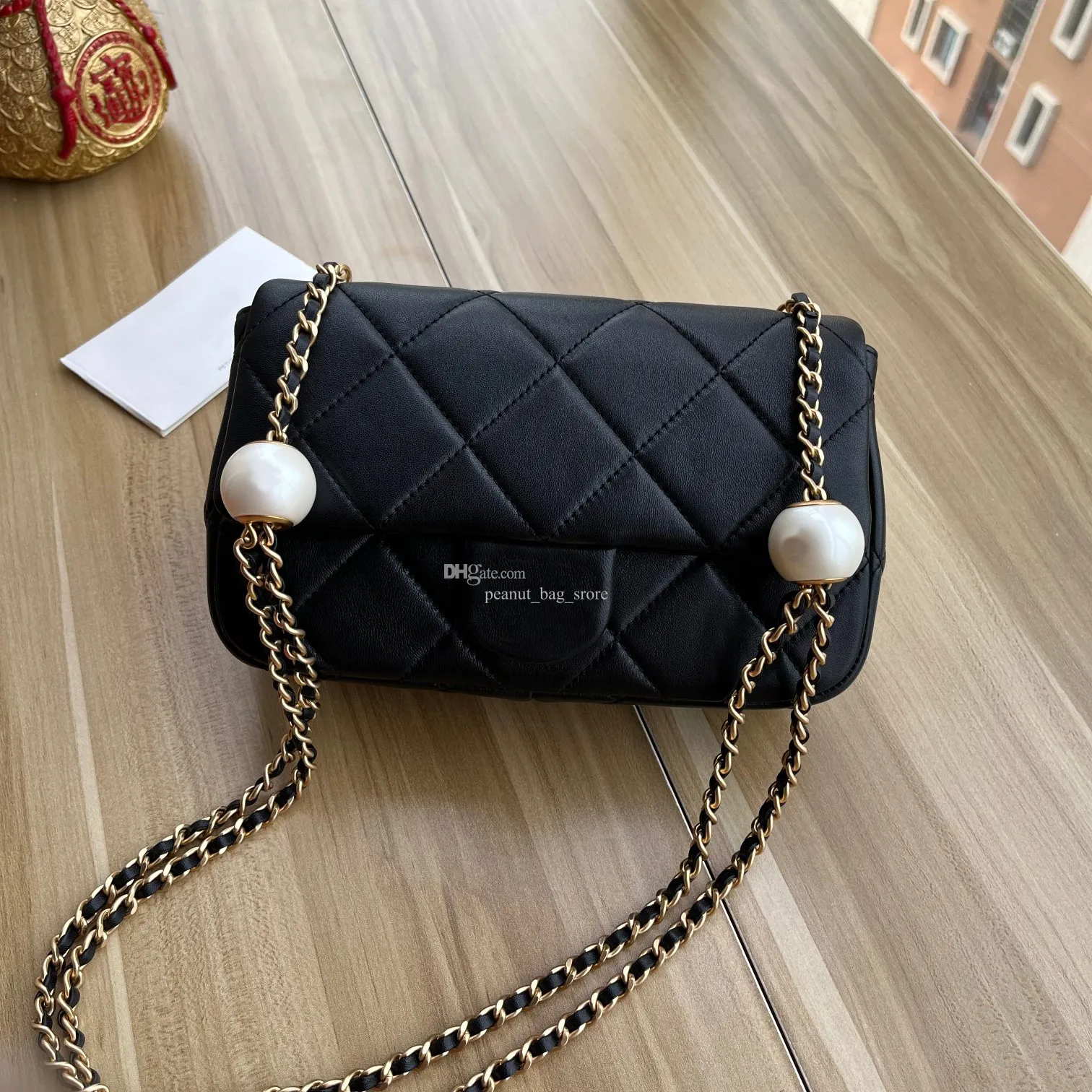 9A Designer Bag 20cm Minimalistiska och eleganta kvinnors handväska texturerade fårskinn Pärla justerbar boll hobo väska utstrålande sofistikering