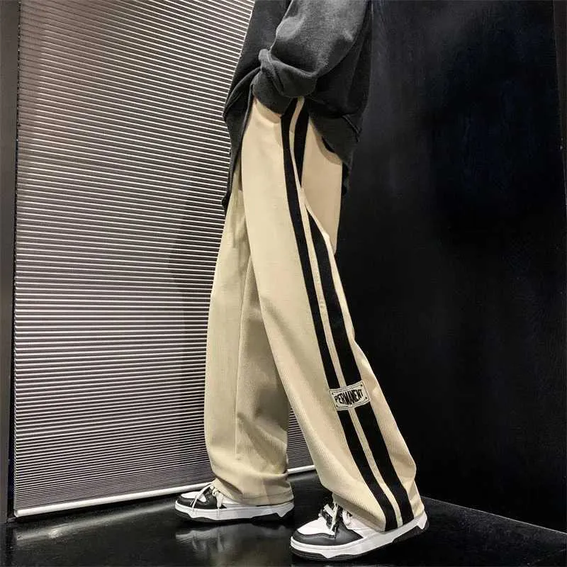 Spodnie męskie Side Pasped Cord o szeroką nogę męskie 2023 Koreańskie modne spodnie ładunkowe