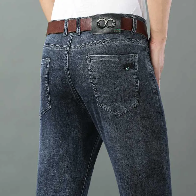 Jeans masculinos jeans fritos masculino de verão masculino de altura da cintura casual calças longas de tubo reto