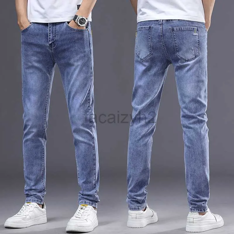 Jeans masculinos Primavera/verão jeans masculinos Slim Fit Pets Small Fents Trend Trendência Pequenas Pés retos elásticos calças longas casuais de tamanho grande