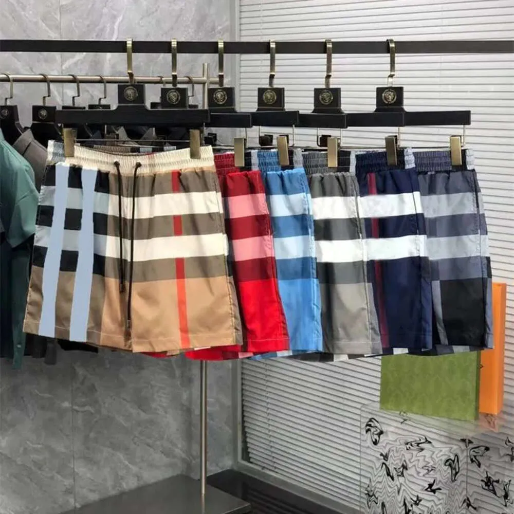 Дизайнерские шорты пляжные шорты короткие клетки Мужские новые летние классические штэк -шорты для мужских шорт модные