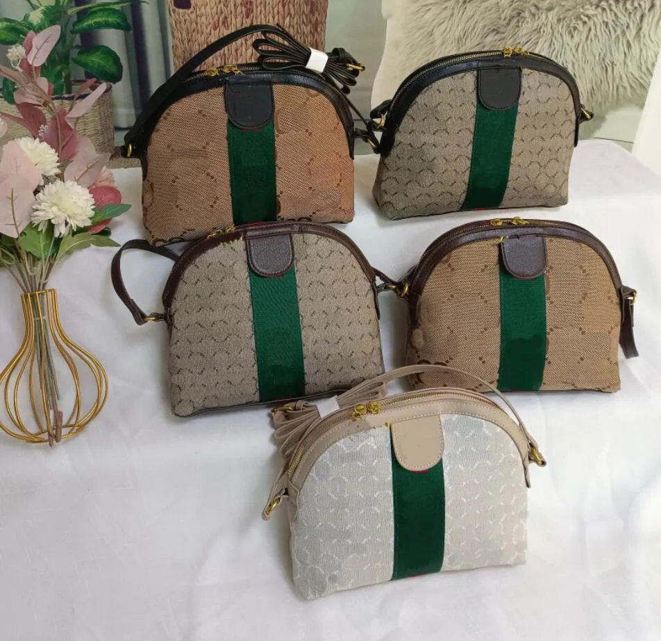 Luksusowe marki torby skorupa kobiety projektant na ramię w torbie crossbody vintage płótno małe tote portfel sprzęgło torebki mody wieczorowe portfel lady messenger plecak