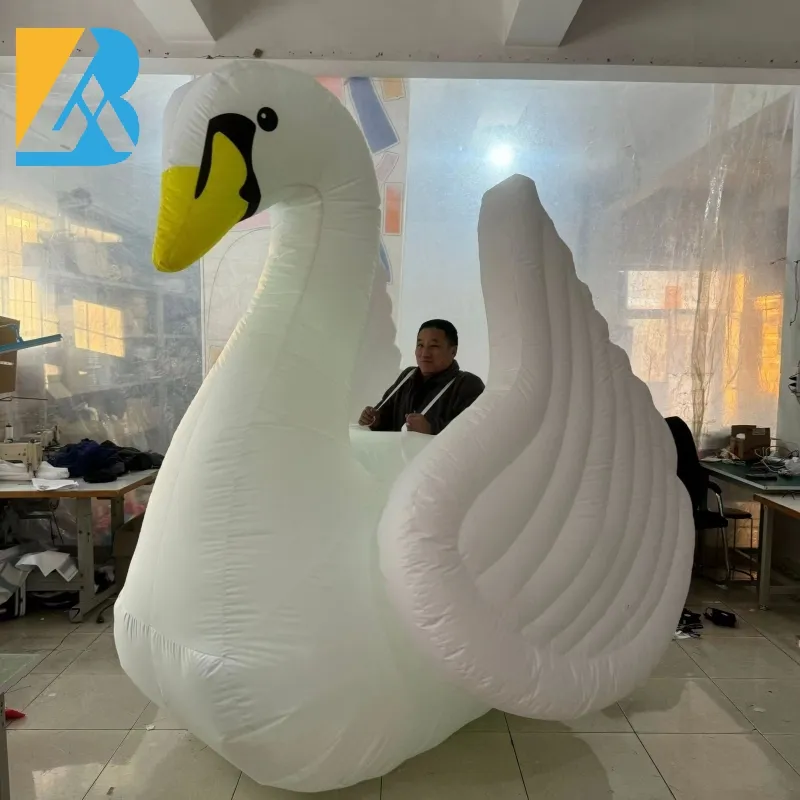 Disfraz de cisne inflable de iluminación de LED de 2.2 metros personalizado para fiestas para el desfile de fiestas