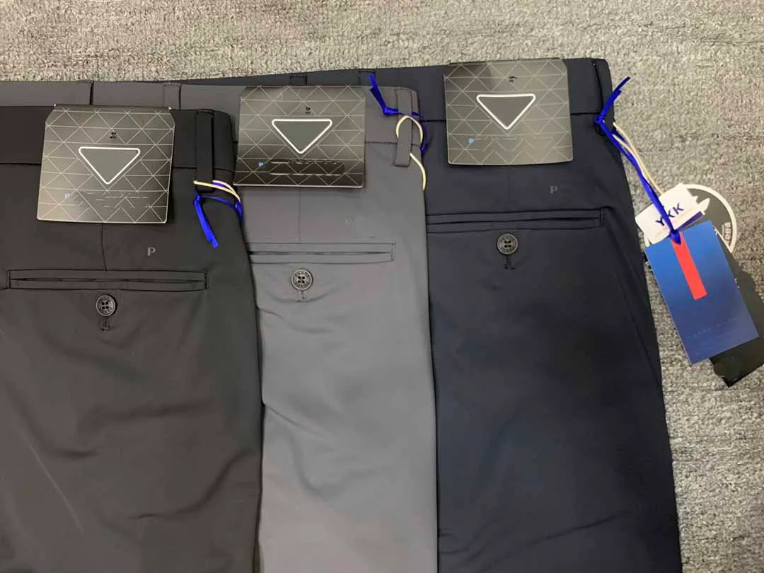 PPP Designer Luxury Men's Dress Pants Pantalones de negocios Pantalones de patas rectas Pantalones casuales de moda Leggings de color sólido Leggings Black Blue Gris al por mayor