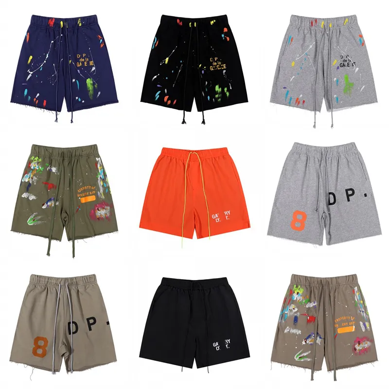 Herrdesigner shorts brev logotyp handmålad bläck stänk tryck high street vintage casual byxor Sommarmän och kvinnors bomullsresery shorts