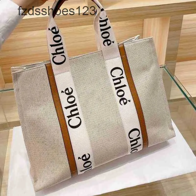 Canvas Woody -Einkaufstasche Designer kleine Handtasche Cloees Einkaufstaschen Buch verkaufen Buchstaben Drucken großer Kapazität Japanischer Tasche Single SH H2JN