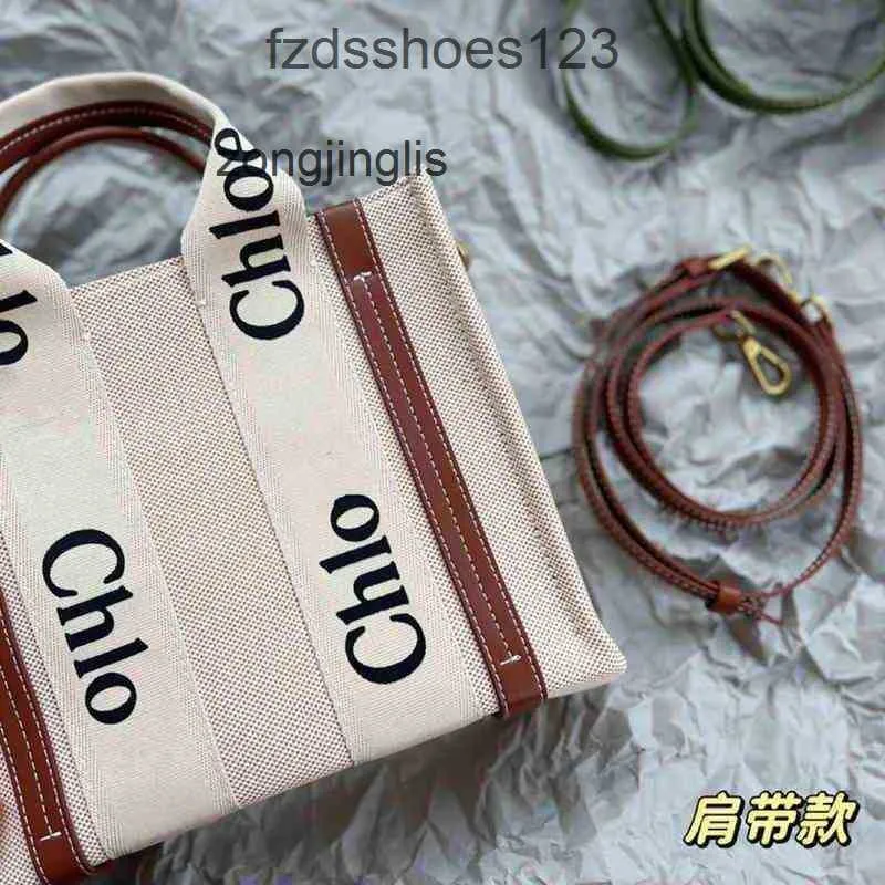 Bolsas de bolsas Diseñador de capacidad Woody grande 2024 Cloee Tote Extrany Hand Hands Tote Women Outlet Tote Fashion de compras portátiles 2x6z