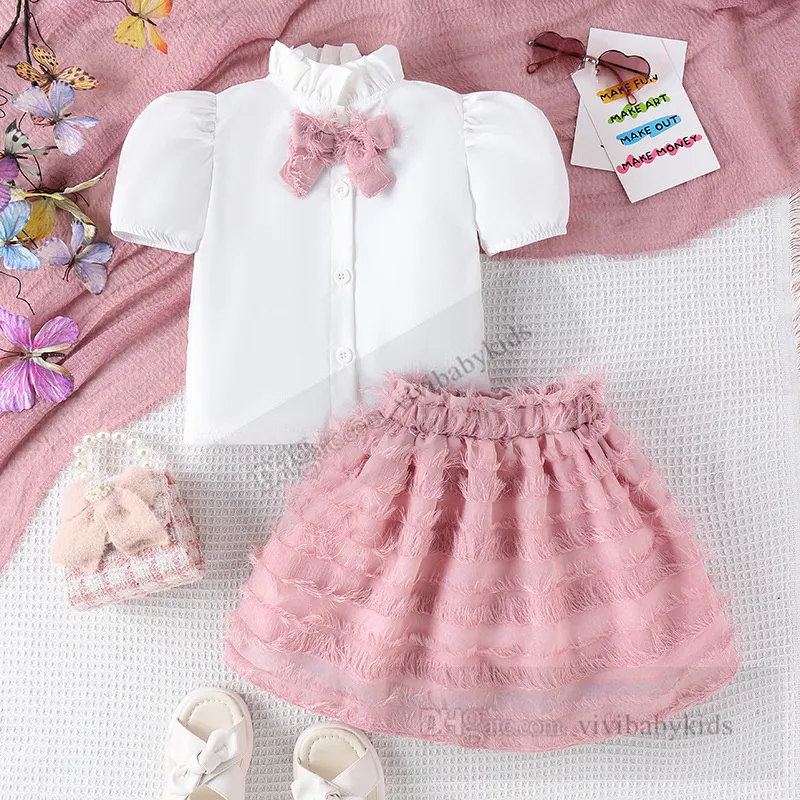 Lindas garotas Princess Roupas Conjuntos de verão Crianças roupas infantil Bows amarrar colarinho de colarinho de manga curta Saias de borla 2pcs z7925