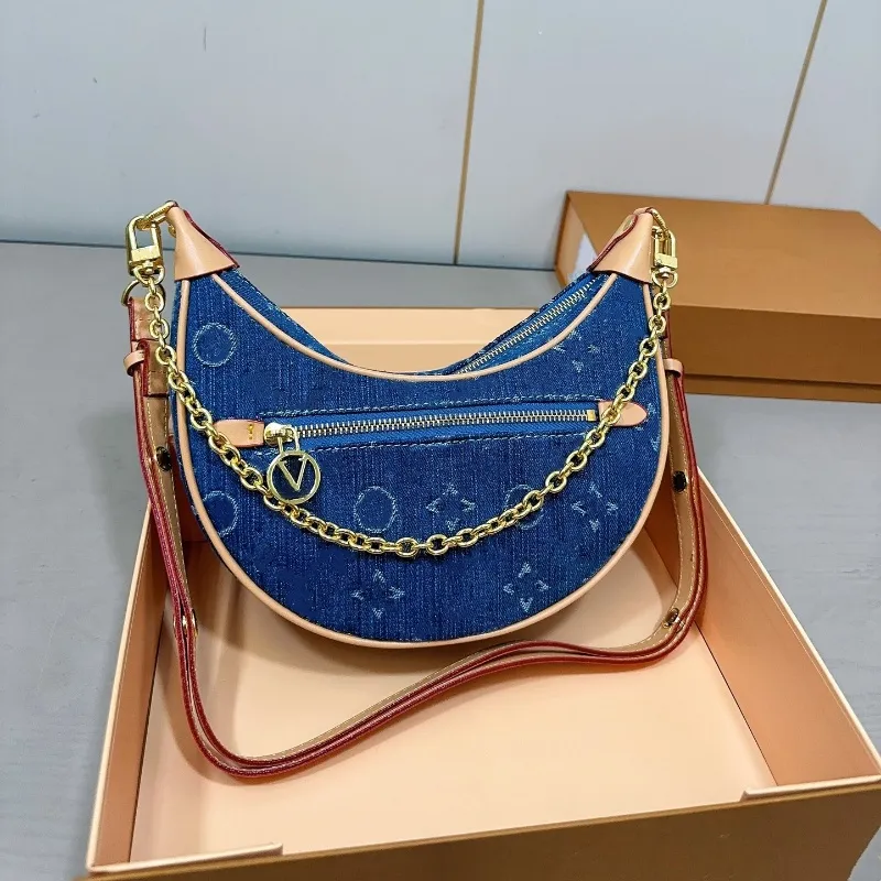 24SS Kadın Lüks Tasarımcı Denim Bezelye Çantası Under Marsh Bag Kadın Tote Omuz Çantası Crossbody Bag Sofistike Şık 26cm