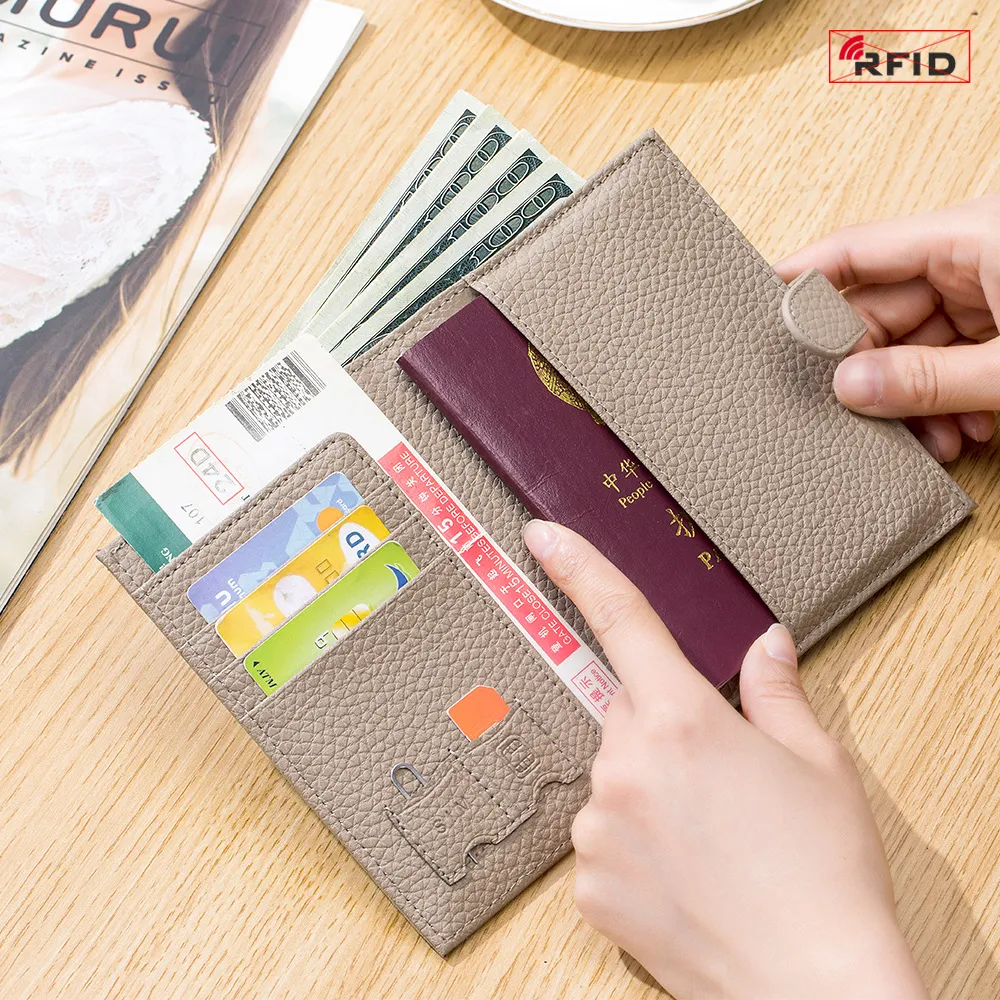 Nieuwe echt lederen RFID Ultra-dunne paspoorttas Multifunctionele portemonnee Tickethouder Paspoort ID Wallet Storage Bag voor vrouwen