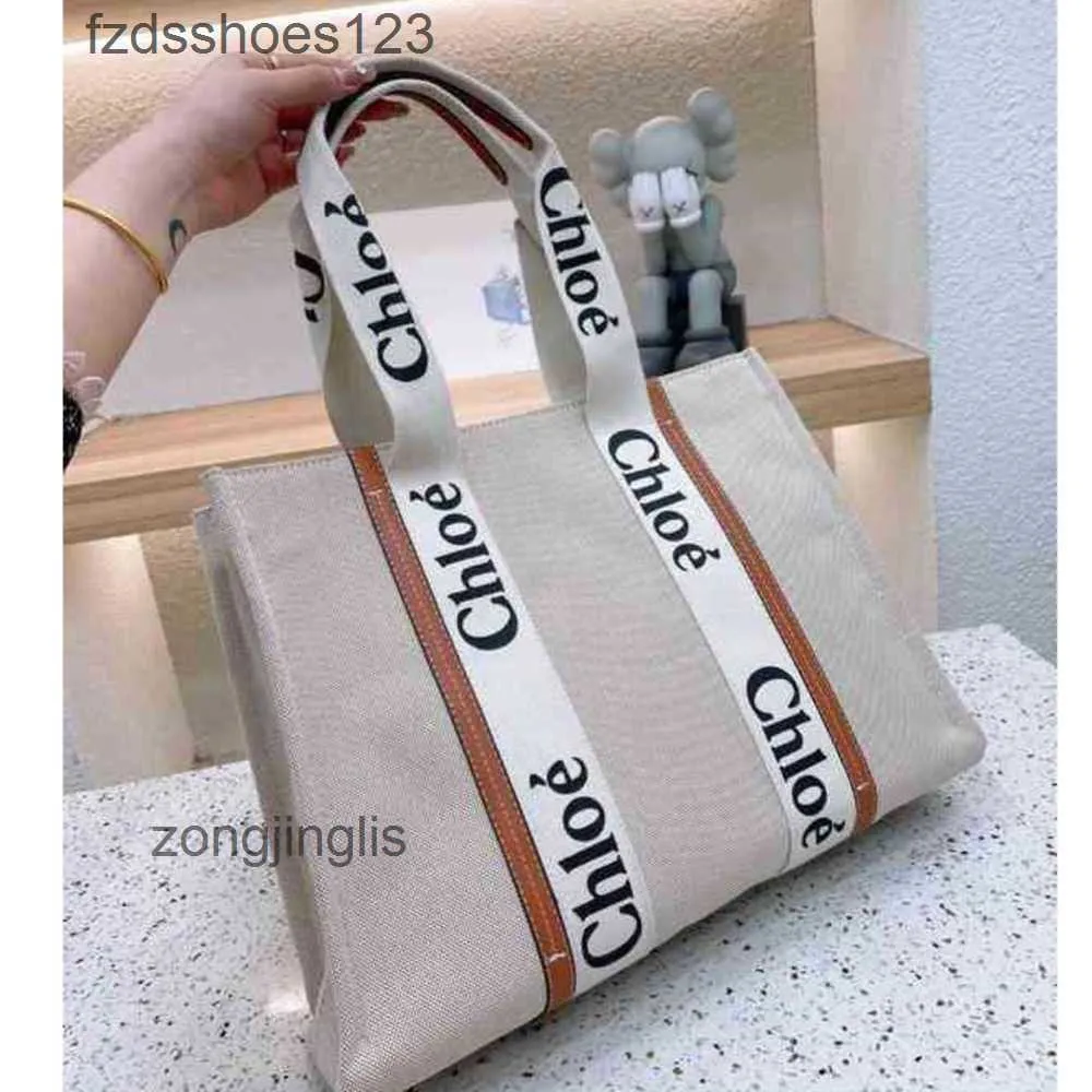 Canvas Cloee Bag Woody outlet Bags Designer Shoulder Handbag Hands 2024 Tote Fashion One Niche Design Portable Large Tote Women's Ca AK46