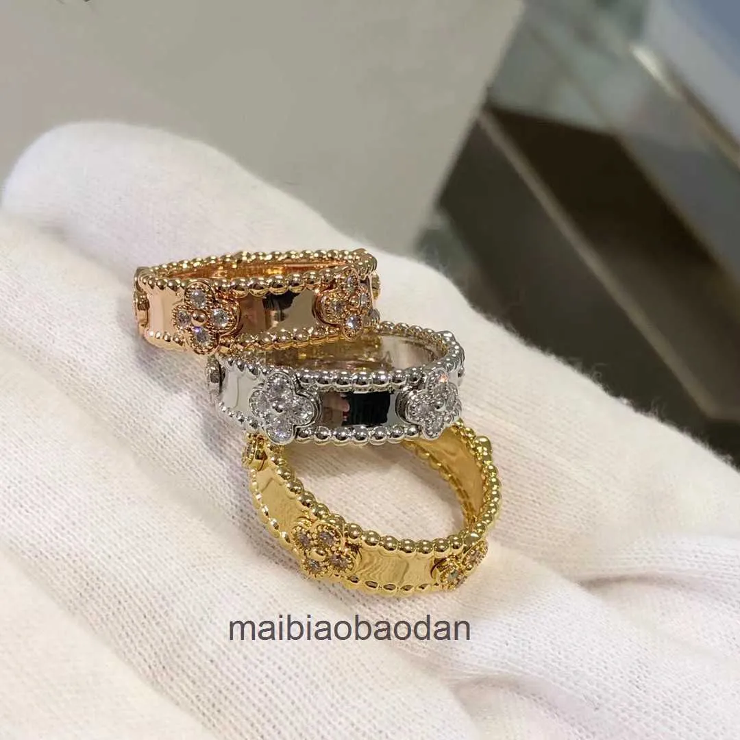Projektant luksusowy pierścień biżuterii vancllf wysoka wersja czterokrotna koniczyna liści v-gold kalejdoskop pierścień plamowany z 18-krotnym różowym złotem CNC Precision Process Process Proces