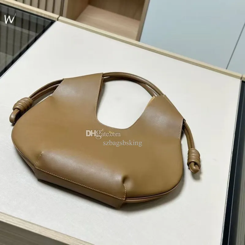 Sac de créateur haut de gamme sac à main pour femmes Nouveau sac en cuir authentique en cuir de grande capacité Fashion DrawString Handd épaule sous-armoise