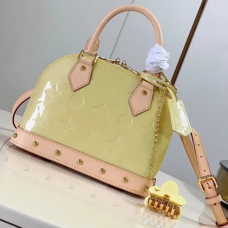 Top Luxury Patent Shell Bag Bag Bolse Bolsas cruzadas Bolso de hombro Bolsas de noche Bolsas de lujo para mujeres Magno de color sólido