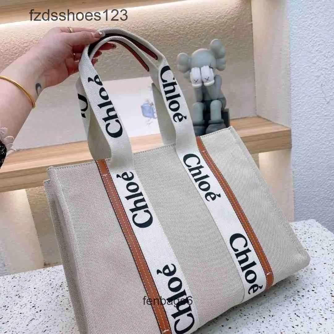 Canvas 2024 Schouder Woody Japanse Tote Bag Fashion Designer Single Cloee Bags Niche Handtas Design Portable Large Tote Dames 7US6
