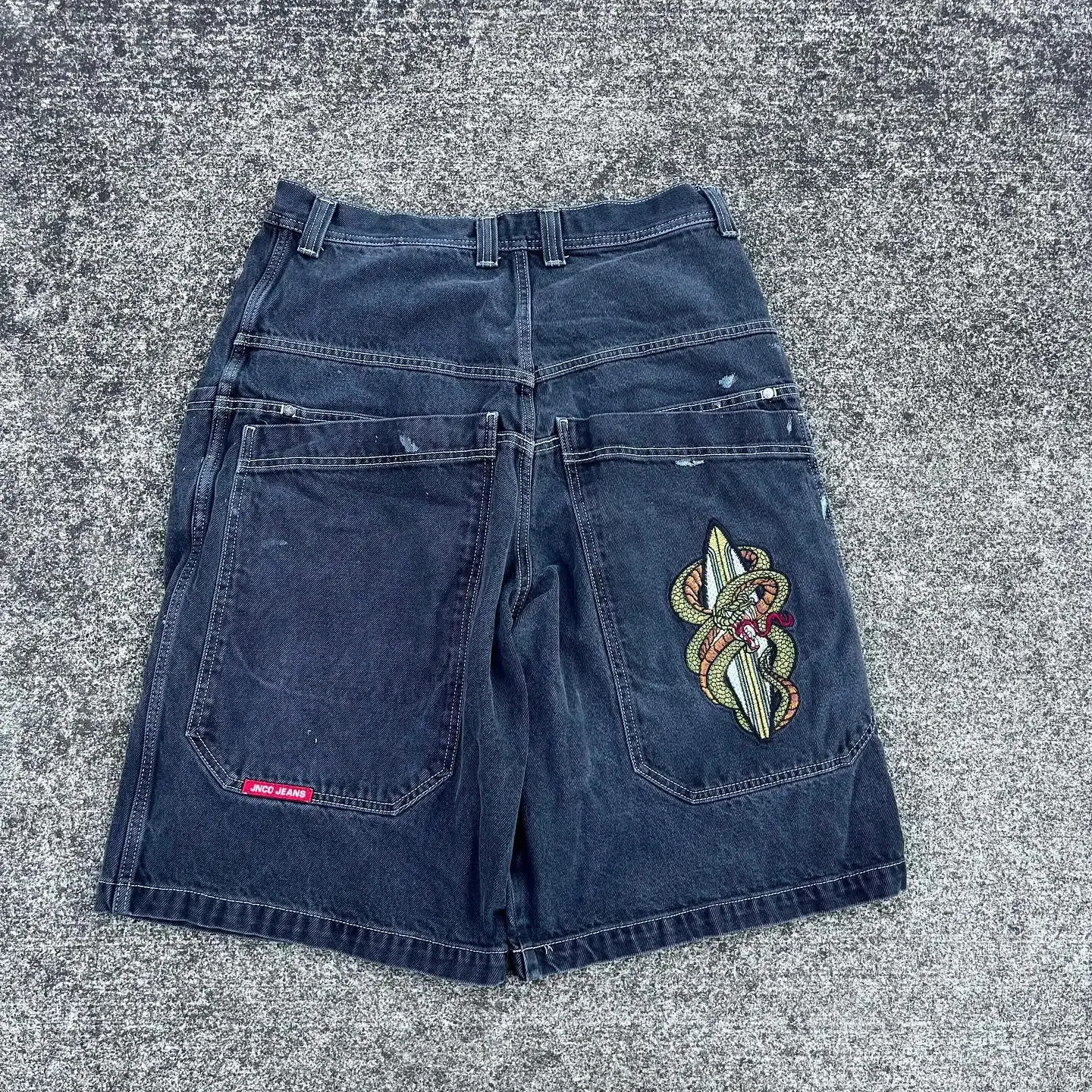 Hip hop retro serpente grafico streetwear jnco cortomes