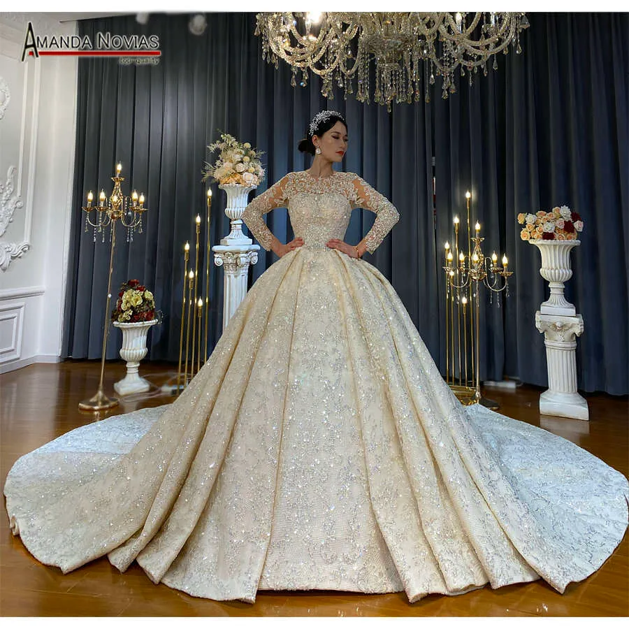 Customized Royal Long Sleeves Wedding Dress Big Train Amanda Novias Color: Beige/ChampagneSuitable Gender: FemaleSize: Not specifiedPattern: Not Customized Royal Long Sleeves Wedding Dress Big Train Amanda Novias Color: Beige/ChampagneSuitable Gender: FemaleSize: Not specifiedPattern: Not