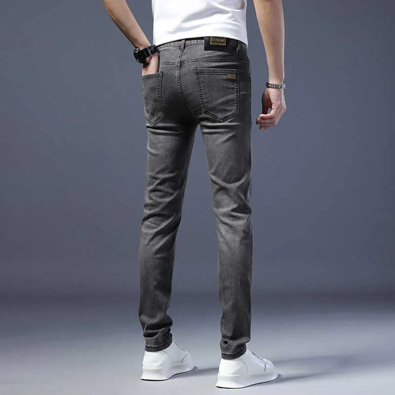 Light 2023 Luxury Grey Jeans Mens Fashion Brand European Slim Fit Small Feet Elastic Busin Pantalon décontracté polyvalent