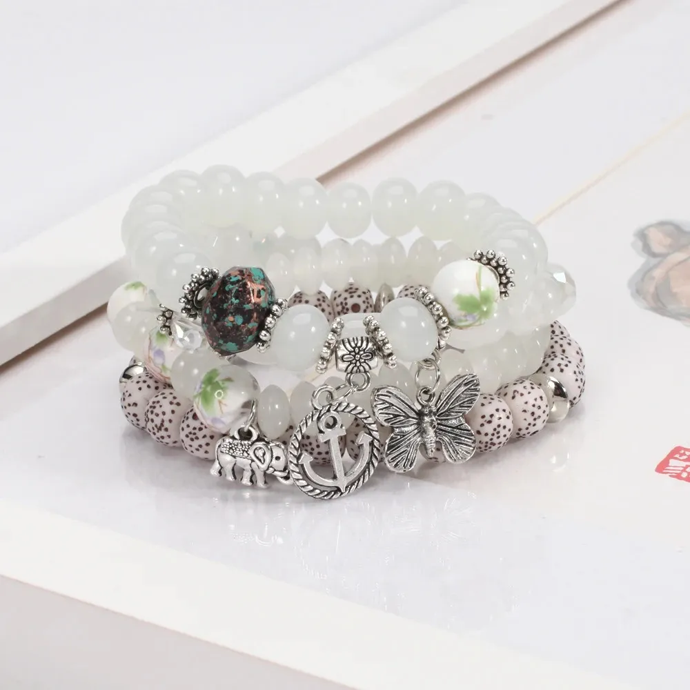 Bohemian Armbandset für Damen, stapelbares Armband mit Schmetterlings-, Elefanten- und Ankeranhänger, Perlen 241125_voghion.com