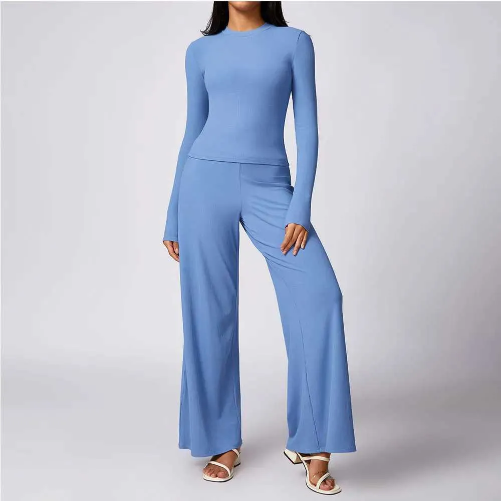 Suits-survêtements féminins 2pcs Les femmes se déroulent l'entraînement sans couture de sports de sport de sport de gym fitness long slve top haut taille pantalon de jambe large combinaison y240426