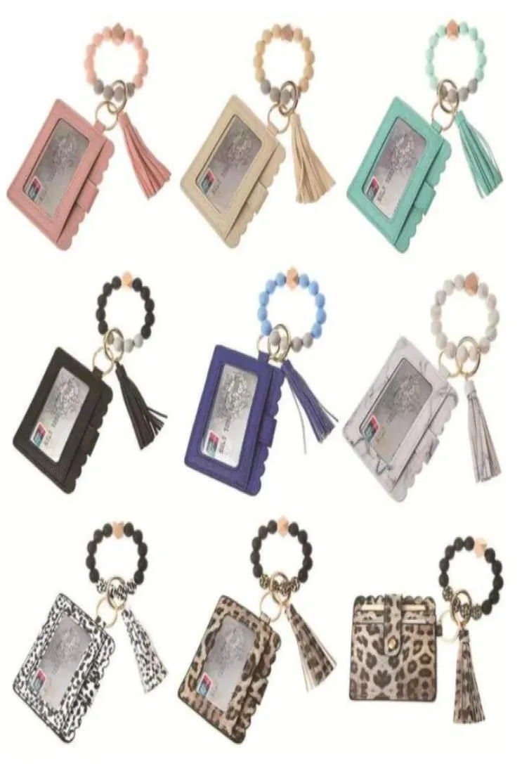 Stock Fashion PU Leather Bracelet carteira Tizhela de chaves Bangle Teclar Titular Bolsa de cartão Silicone Pulsed Kicchains Handb3263247
