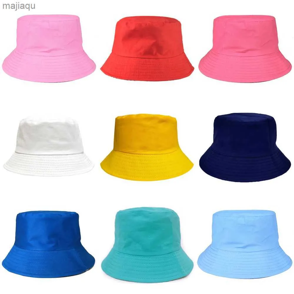 Caps Hats Wholesale of 1 piece of solid color Chinese New Year/Summer parents/childrens fisherman hat childrens basin hat adult fashion flat top sunshade hatL240429