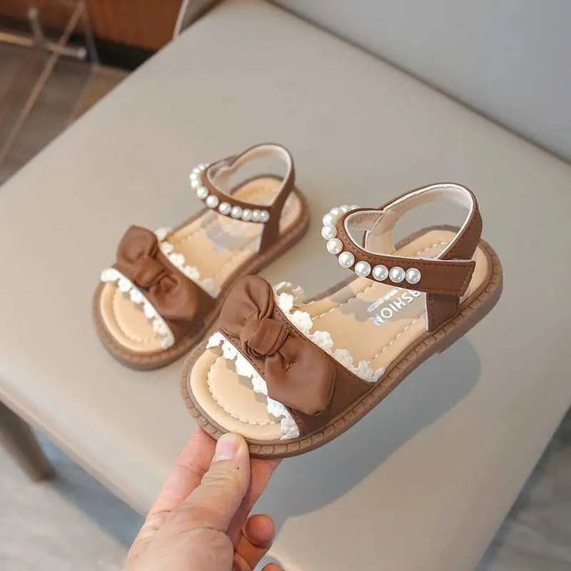 Sandálias Sapatos infantis pérolas arco pérolas abertas novos apartamentos de verão infantil sandálias de meninas casuais não deslizam o estilo japonês simples para vestidos