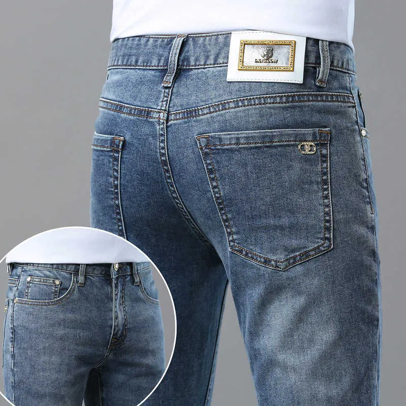 Hösten 2023 Produkt Jeans Mens Slim Fit Small Straight Ben Fashion Märke Mångsidiga elastiska byxor High End European varor