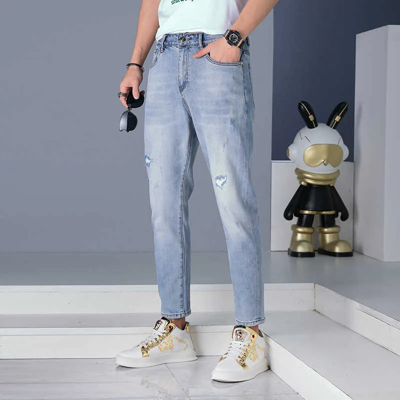 Jeans Point Nove para homens Marca fina de verão Distrava a versão lisa Blue European Slim Fit Leggings