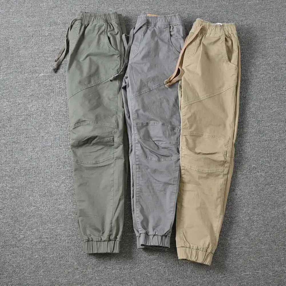 Pantaloni da uomo pantaloni sportivi da jogger alla moda pantaloni ultra-sottili pantaloni da uomo a colori solidi pantaloni da carico da uomo abbigliamento 2403