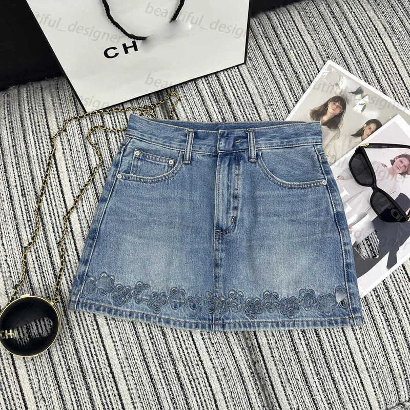 Fashion designer women's jeans Spring and Summer New Fresh Academy Style Heavy Industry Flower Hollow Pure Cotton High Waist A-line Denim Short Skirt