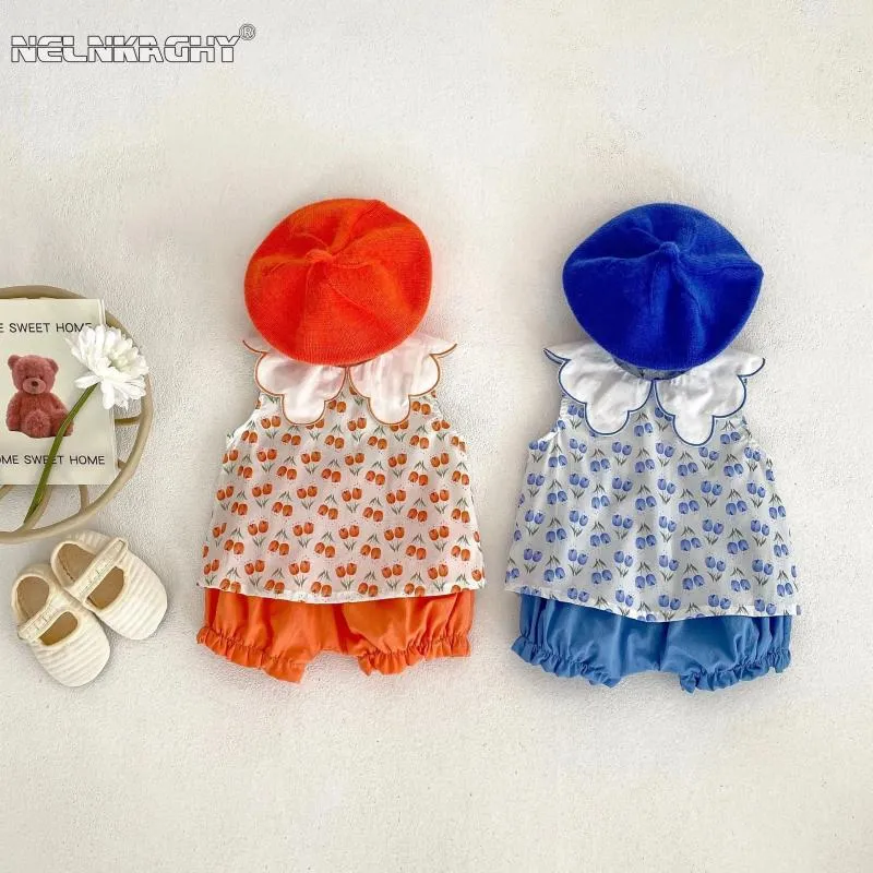 Kledingsets Kid babymeisjes Zomer mouwloze bloemblaadjes Kraag Bloemtop T-shirts Solid Color Ruched Shorts Kinderen Infant Cotton Set