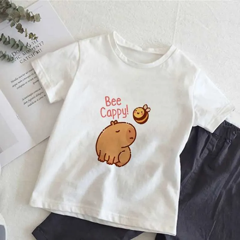 القمصان Capybara Childrens T-Shirt Cartoon Kawaii ملابس غير رسمية الأولاد والفتيات أعلى clothingl2404