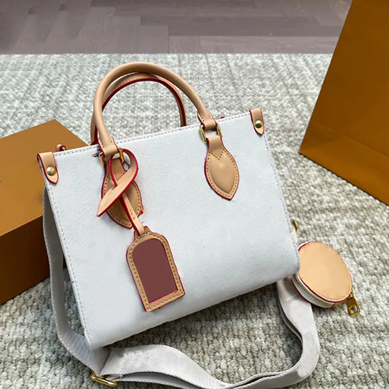 Lita de ombro largo com bolsa de bolsa de designer de alta qualidade com uma pequena bolsa redonda de metal de ouro grande bolsa de compras de verão bolsa de praia de verão